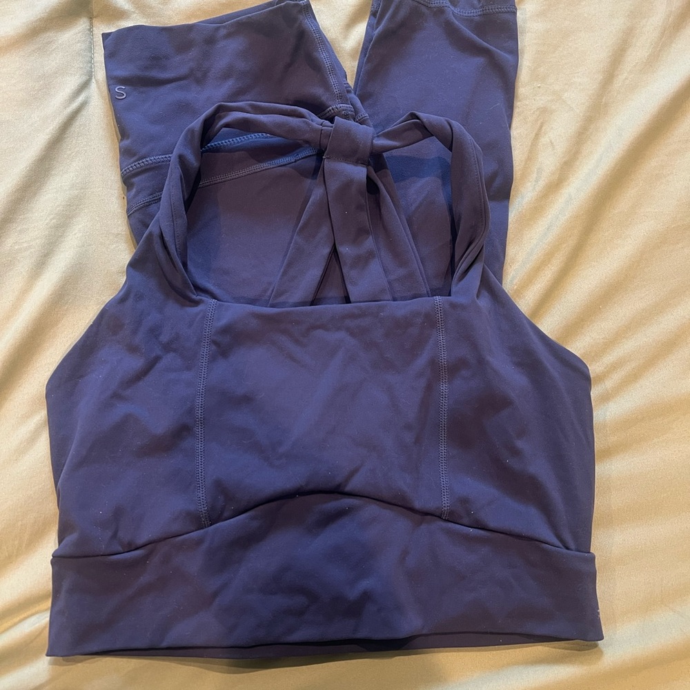 Used, Blue set of ilus workout clothes and one pair of burgundy leggings.